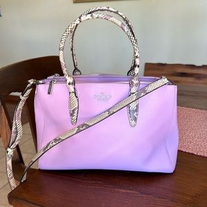 Kate Spade lavender leather satchel with snakeskin print handles and strap.